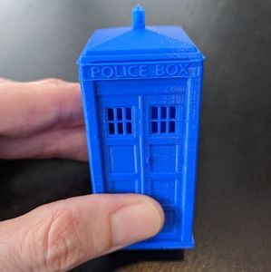 Dr Who Tardis blue police box figurine. The Doctor